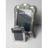 A London silver photo frame, 1988, 9 x 6 cm and a silver plated photo frame