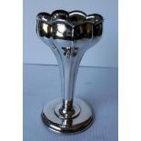 An Art Nouveau silver vase with stylized floral design on a spreading foot by G Loveridge & Co,