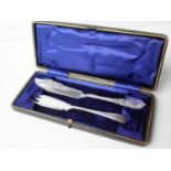 An Edwardian cased silver butter knife and fork, Sheffield 1908