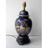 A Wilton ware table lamp base with hand-decorated enamel and gilded Chinese pattern on a cobalt blue