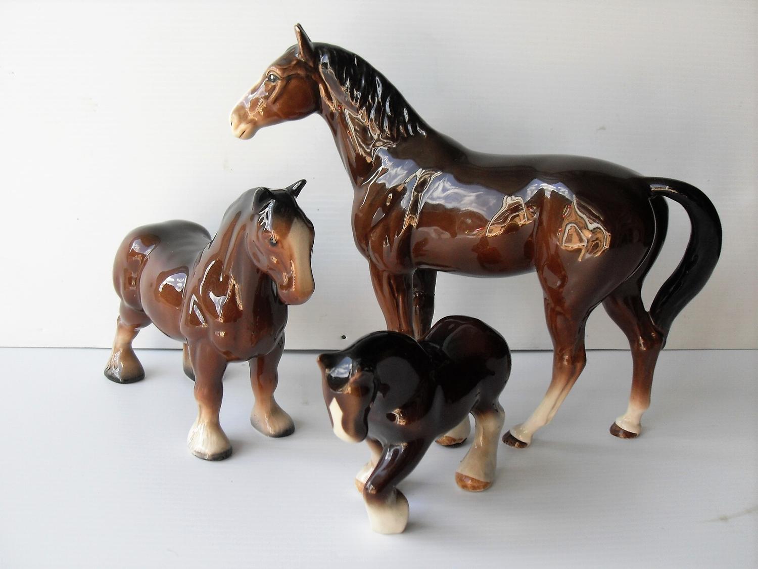 A Sylvac model of a stallion (repair to front leg), two Beswick horses and two katschute horses (