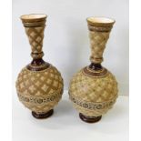 A pair of Mettlach globe-and-trumpet shape vases with raised floral decoration, Ges-Gesch 1241, each