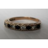 A 9ct yellow gold half-hoop diamond and sapphire eternity ring 2.28g, size M