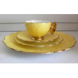 An Art Deco Aynsley lemon yellow butterfly-handle tea set (lacking teapot) comprising six teacups