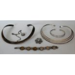 A torc-style silver .925 necklace, a silver pendant on chain, a George V coin bracelet, a white