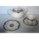 A 34-piece Wedgwood porcelain tea service decorated in the 'Osborne' pattern comprising cups x 6,