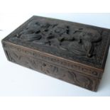 An Indian carved hardwood jewellery box with Royal Artillery insignia to top, 'ubique quo fas et