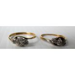 Two 18ct yellow gold and platinum three-stone crossover diamond ring, size 0, P, hallmarked. Gross