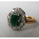 An emerald and diamond dress ring, 4.7g, size O, hallmarked 18K