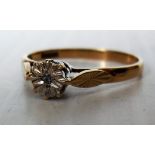 A 9ct yellow gold solitaire diamond ring in a claw setting, approximately 1pt, size N, 1.5g