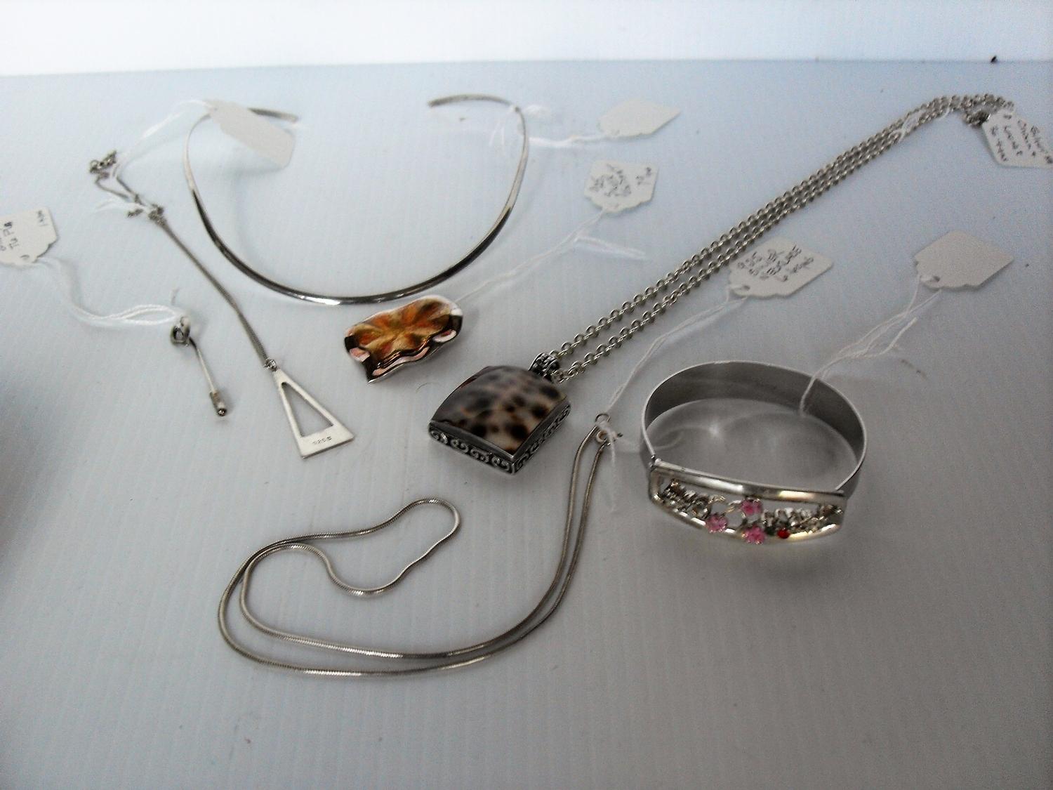 An assortment of seven .925 silver jewellery