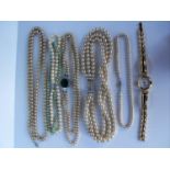 A selection of five costume and cultured pearl necklaces (one damaged) and a lady's gold plated