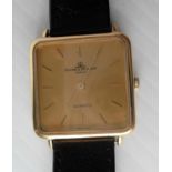 A Baume & Mercier 1990's gent's 18ct yellow gold quartz watch with square champagne-colour dial,