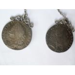 A George II 1746 half crown and a George III sixpence dated 1787, with semee of hearts, both mounted