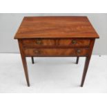 A Georgian oblong mahogany occasional table with two short and one long drawer, ring-turned brass