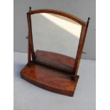 A George III mahogany and crossbanded bow-fronted vanity mirror with string inlay twin drawers