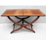 A 19th century mahogany folding table with X-stretcher support, 51 x 92 x 50 cm