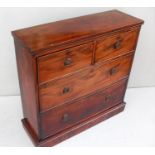 A 19th century mahogany chest of two short and two long drawers of narrow proportions with brass