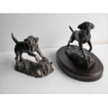 A cold cast bronze labrador by J. Spouse on a mahogany plinth and a bronzed resin retriever