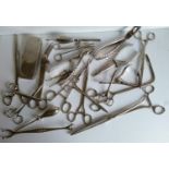 A collection of twenty-one vintage surgical instruments to include: double-ended tissue