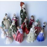 A selection of eleven Royal Doulton ceramic figurines of ladies: Fragrance, The Rag Doll H N 2142,