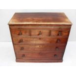 A Regency mahogany bachelor's chest of drawers with shaped top, brushing slide, three short and