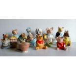 A selection of twelve First Edition Beswick and Disney Beatrix Potter figurines (nine brown) to
