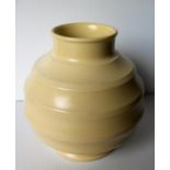 A Wedgwood globular vase, designed by Keith Murray in cream, printed signature to base, 16 cm H