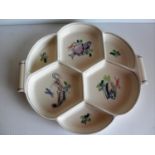 Two vintage Poole Pottery hor d'oeuvres dishes with fish and floral designs by Truda Carter circa.