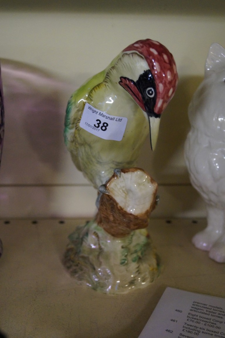 A Beswick model of a woodpecker no. 1218.