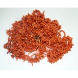 A collection of coral and imitation coral necklaces, to include; a beaded blush coral necklace,