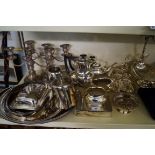 A large quantity of assorted silver plate to include tea service, candelabra etc.