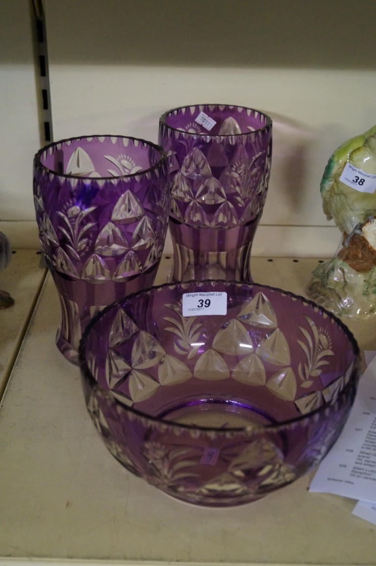 Three pieces of 20th Century Flash glass to include a pair of vases.