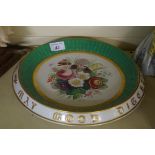 A 19th century continental bread plate having hand painted floral decoration with Italian motto to