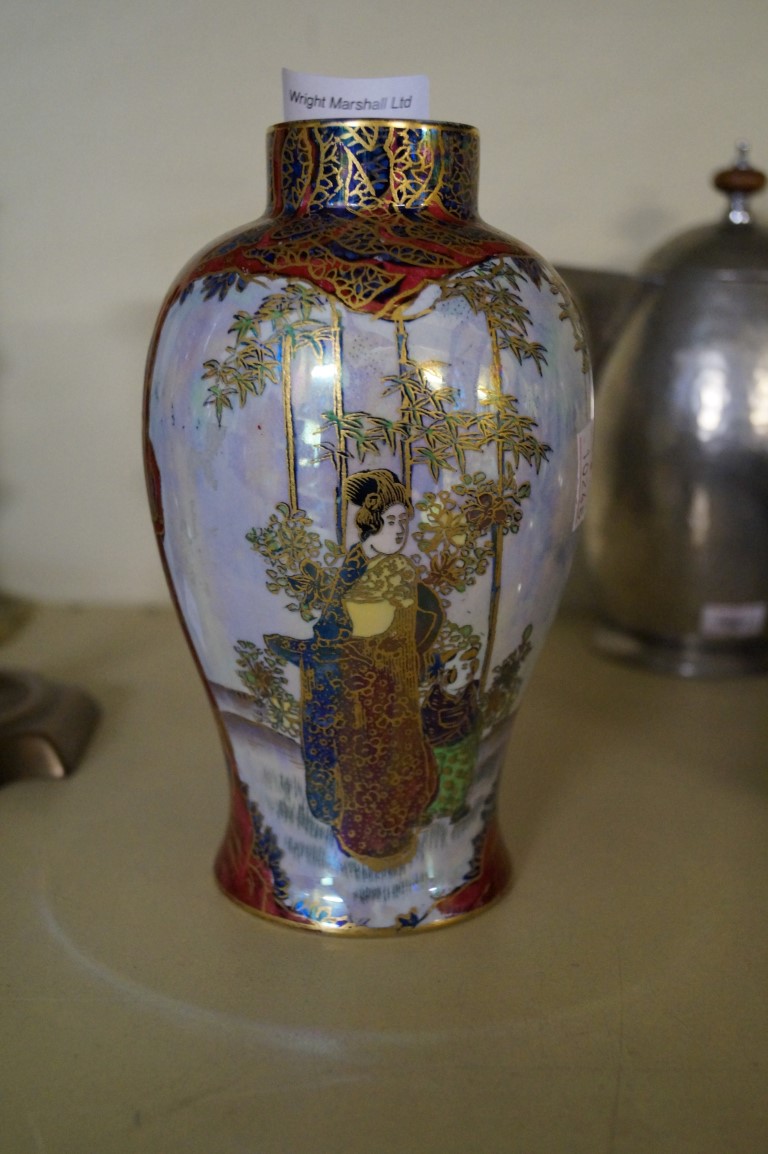 A Wilton ware hand painted lustre jar depicting oriental figures in landscape scene.