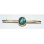 A turquoise and yellow metal bar brooch , stamped 9ct, weight 1.