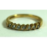 A 9ct gold diamond set half hoop ring estimated diamond weight 0.17ct, weight 1.3g.