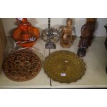 A group of wooden African tourist ware items to include figures etc and wall carvings together with