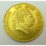 A George III gold half sovereign dated 1818 In extremely fine condition reference Spink 3786