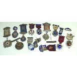 A collection of approx fourteen good quality silver and enamel Masonic badges,