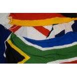 A collection of cotton flags To include England (2), France, Scotland,