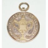 A 9ct gold Bradford Cricket League prize medal dated 1916 Awarded to D. T.