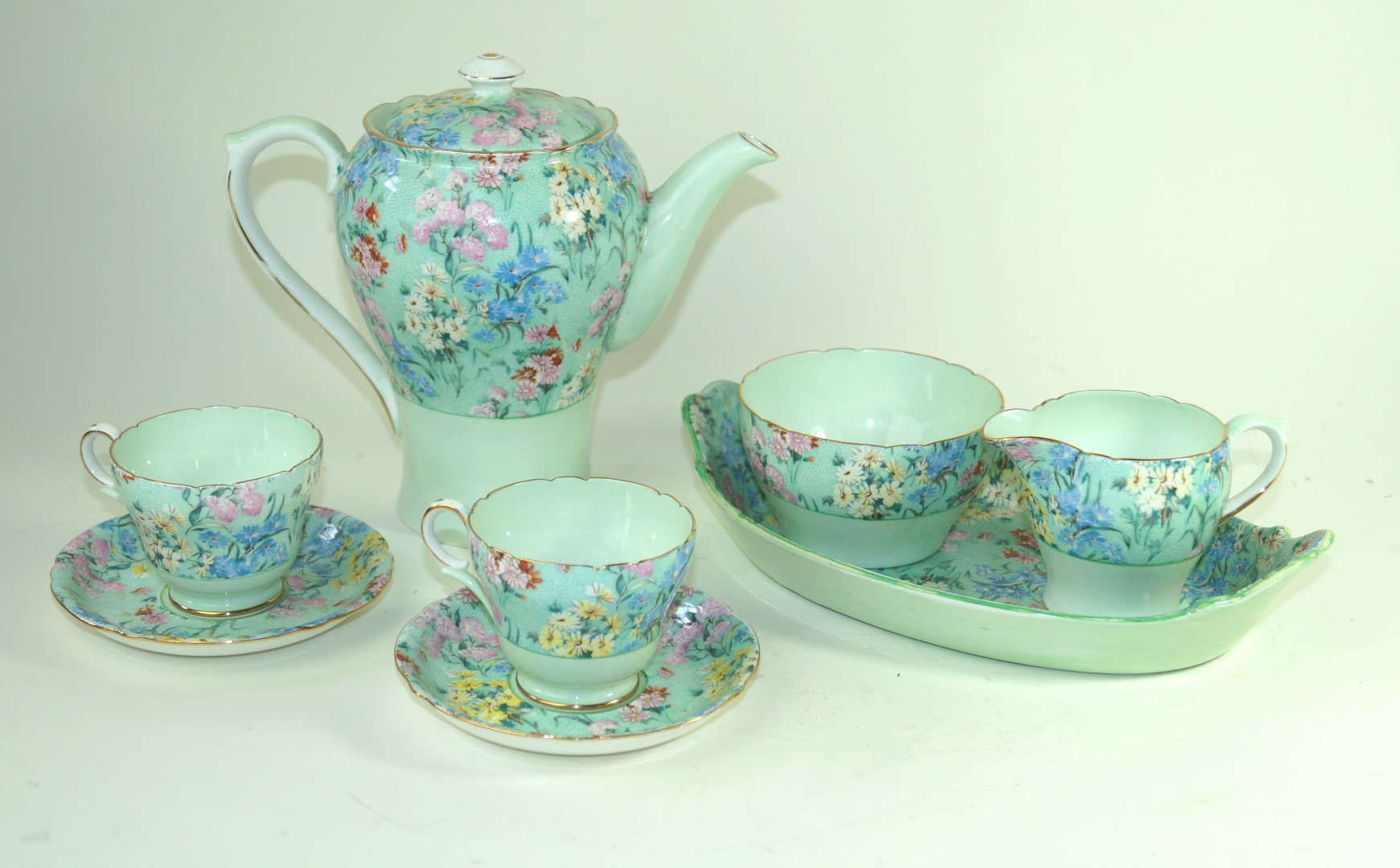 A Shelley Melody six setting tea service Comprising teapot, milk jug, sugar bowl, six cups,