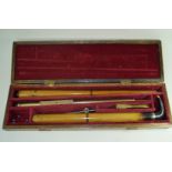 A cased 36 calibre twin section air cane,