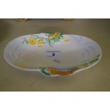 A Clarice Cliff oval bowl having relief decoration.