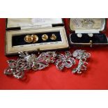 A set of four 9k gold studs Cased, together with, two further unmarked studs,