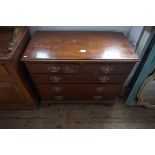 A Georgian style mahogany straight front chest of two short over three long drawers,