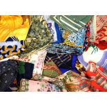 A large quantity of various vintage silk scarves and neckerchiefs Each of varying size and design,