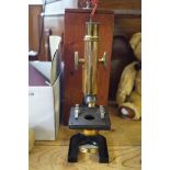 A mahogany cased W.Watson and Sons of London microscope.