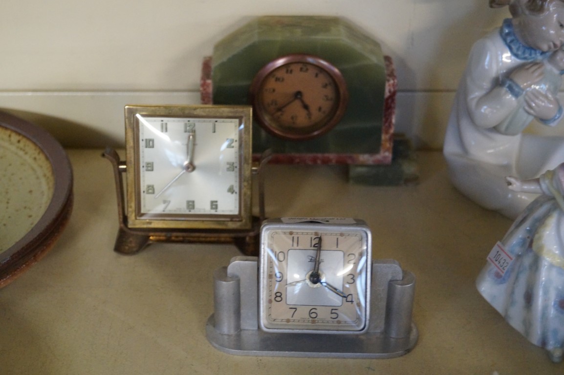 Three assorted Art Deco clocks to include an onyx and marble example.
